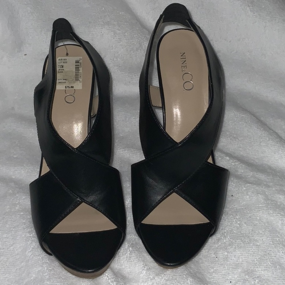 Black and tan crisscross heels